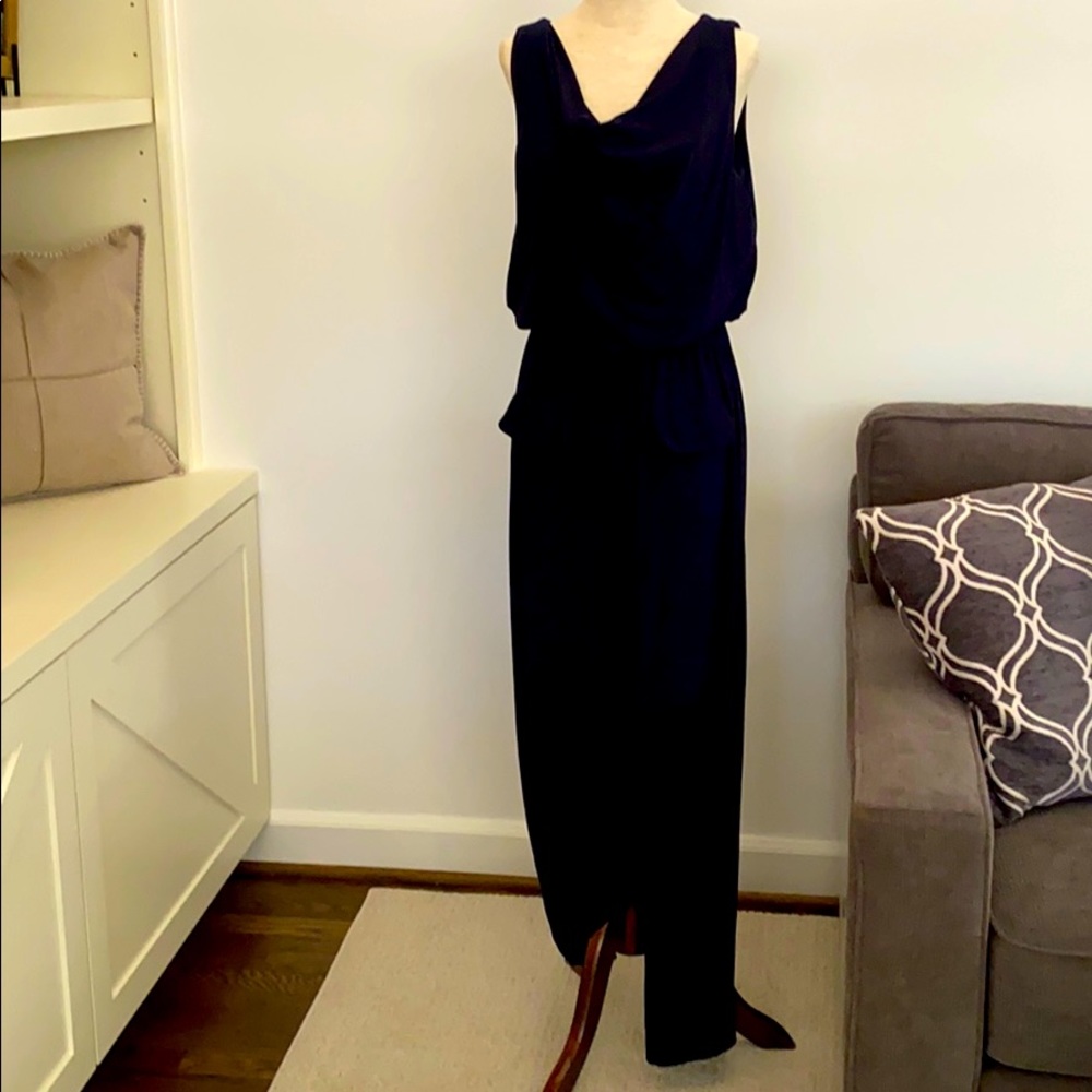 Navy blue sleeveless jumpsuit. Size M